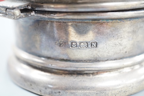 A George VI part engine turned silver circular powder box, A&J Zimmerman, Birmingham, 1937, 9cm.